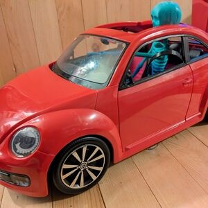 Red Toy Car with Skeleton Driver